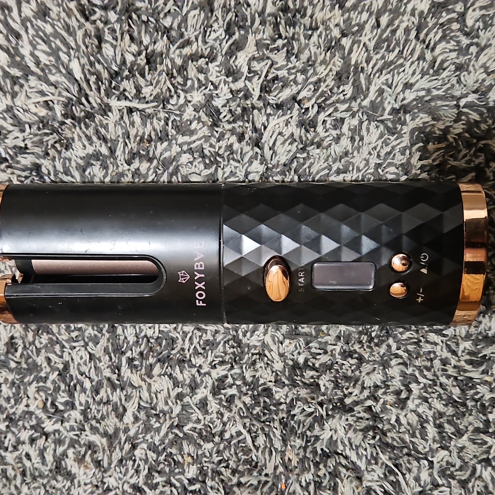 Self curling iron cordless